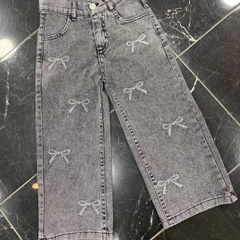 Jeansy dziecięce 100% bawełna z ozdobnymi kokardkami – efekt spranego denimu